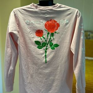 Pink T-shirt with Rose print.